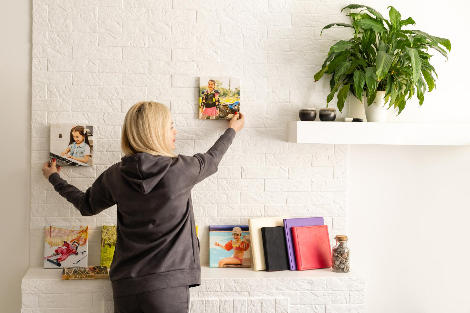 Woman holding a photography with gallery wrap photo printed canvas.