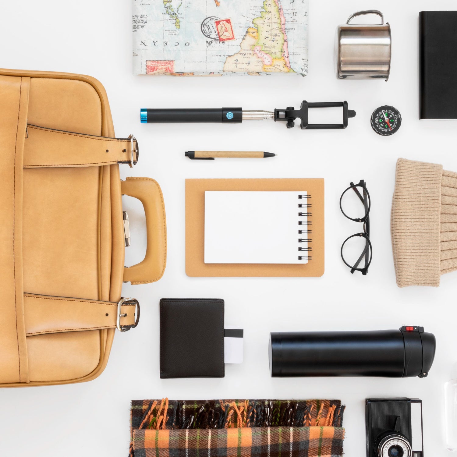 Travel Still Life Pack Flat Lay - A visually pleasing arrangement of travel essentials neatly packed in a flat lay style.