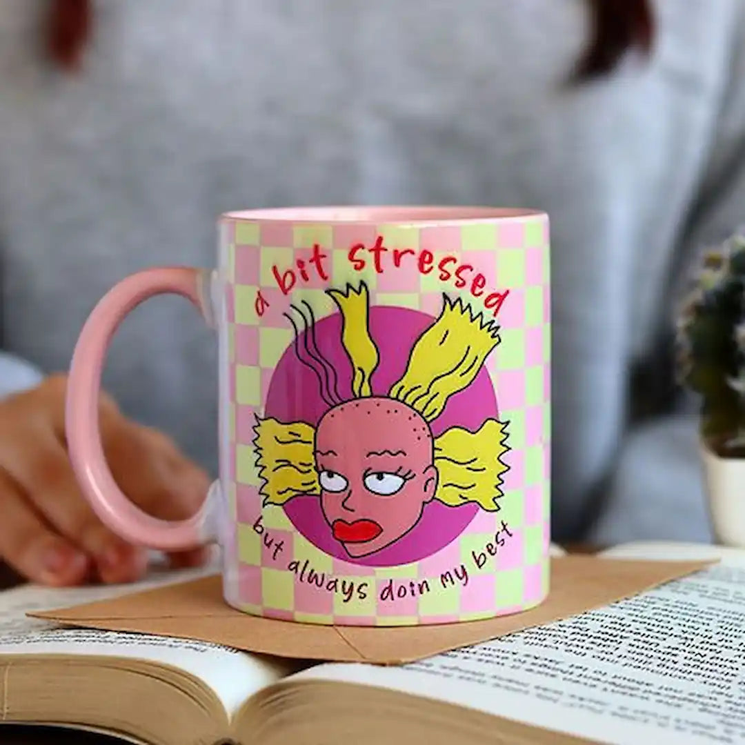 Graphic mug with 'A Bit Stressed' design.