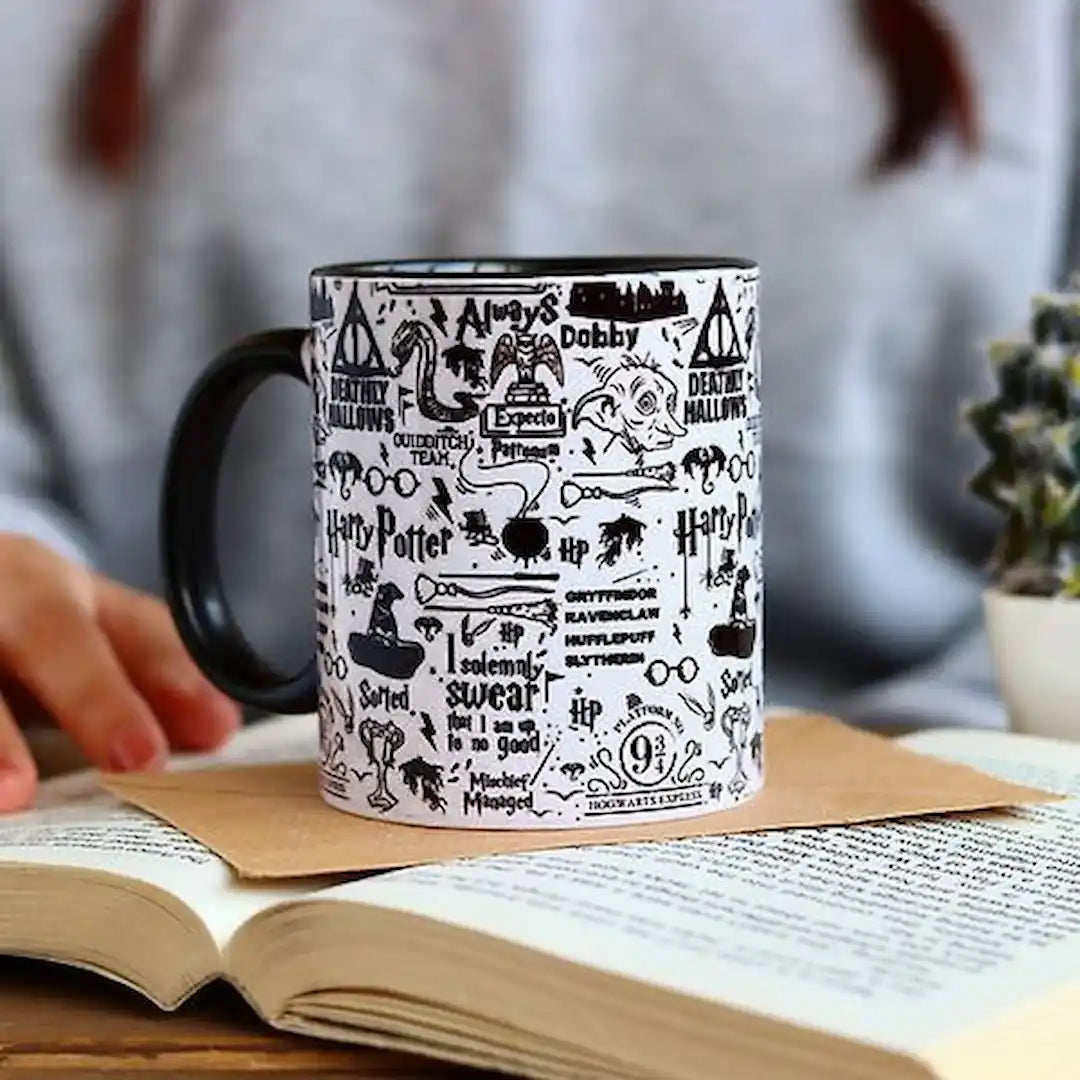 Black & white graphic mug with magical design.