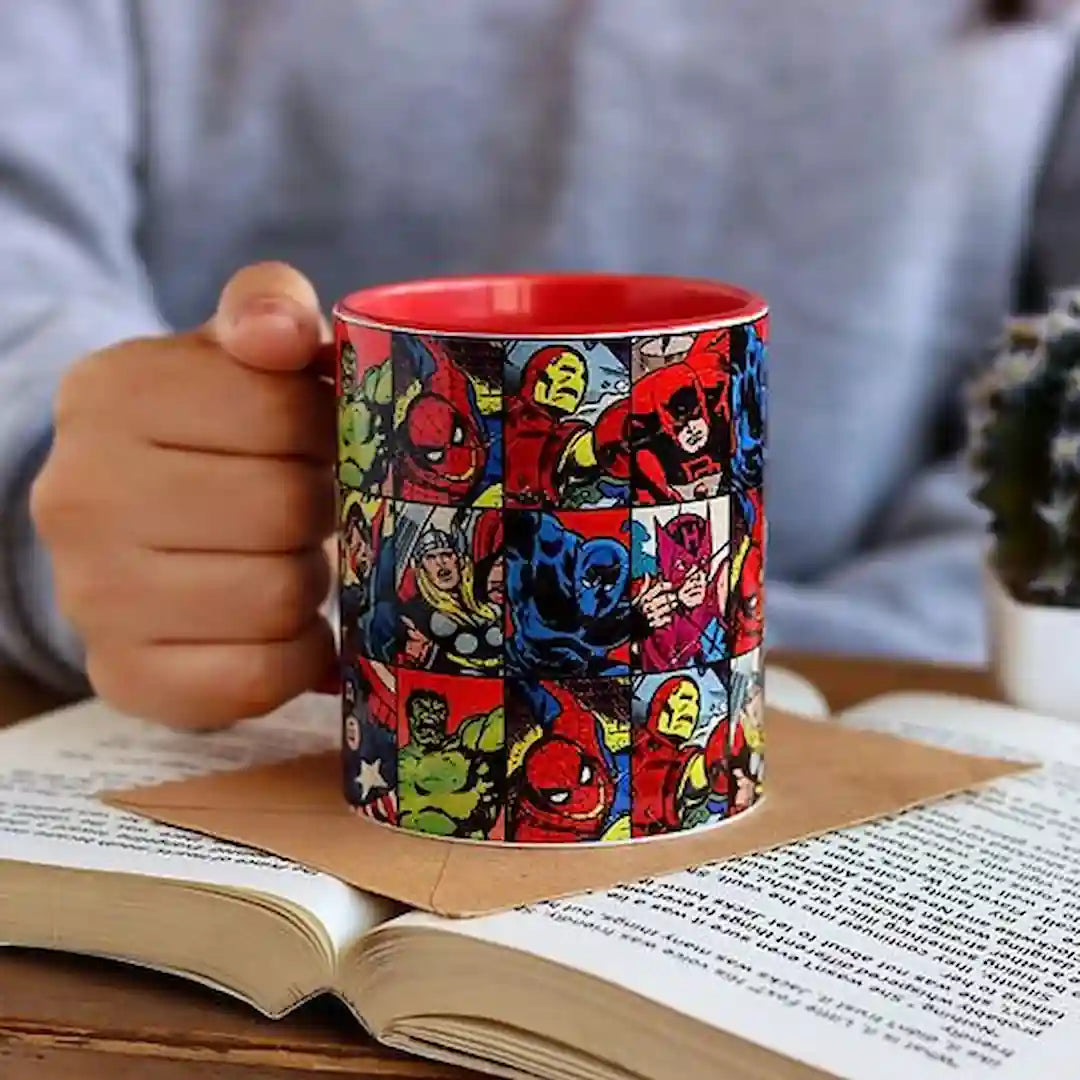 Graphic mug featuring Spiderman design.