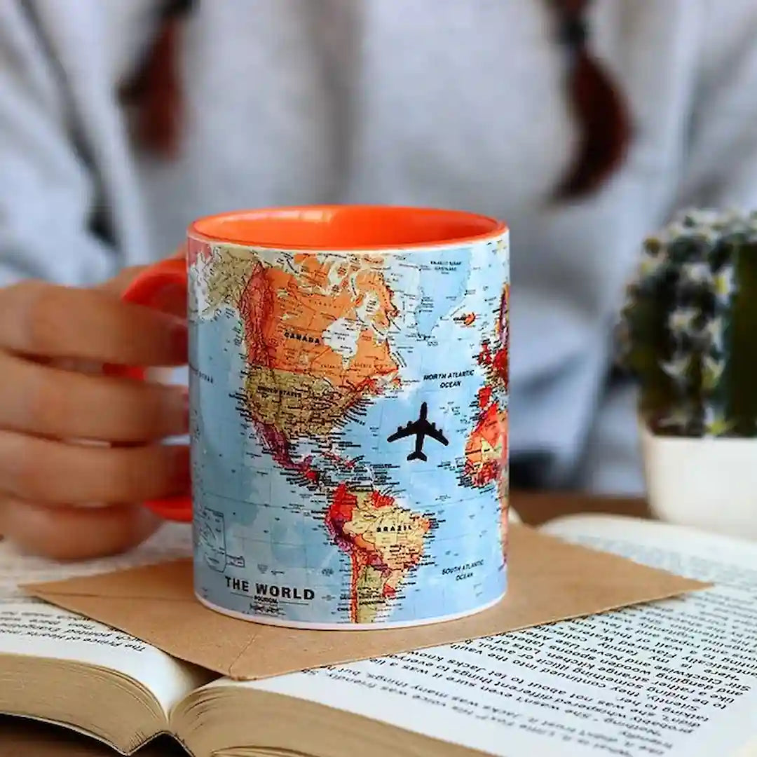 Graphic mug showcasing world map design.